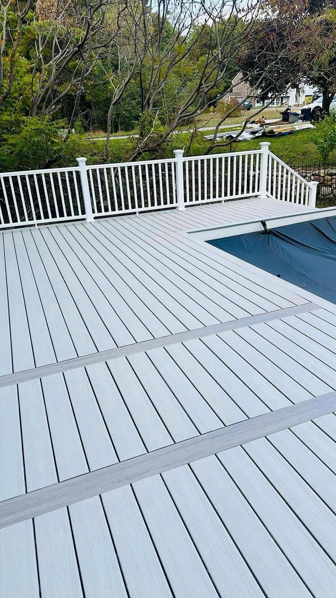 Custom composite pool deck built by KDM Home Improvement on Cape Cod